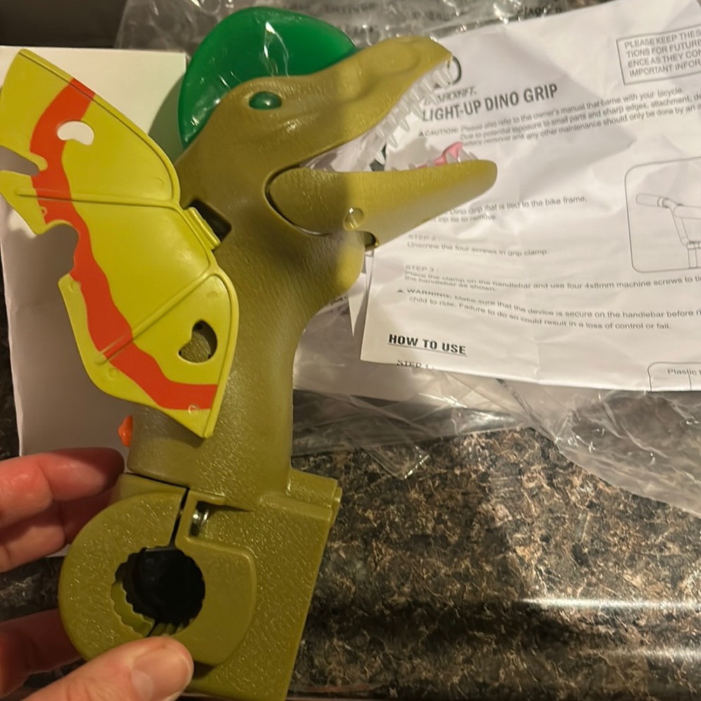 Brand new Dynacraft light up Dino grip for boys bike